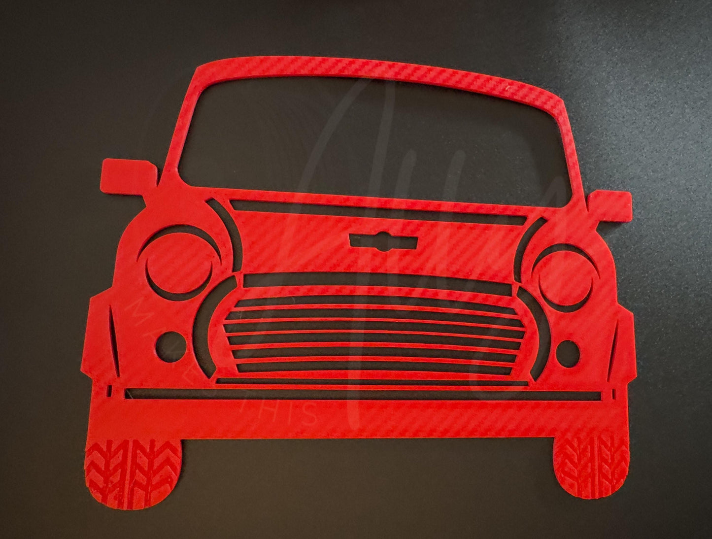 Flat-lay view of wall art design on black surface